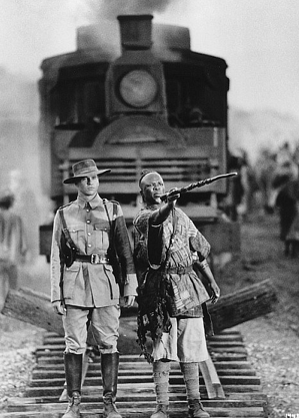 Col. Patterson with Samuel on the train tracks going through Tsavo.